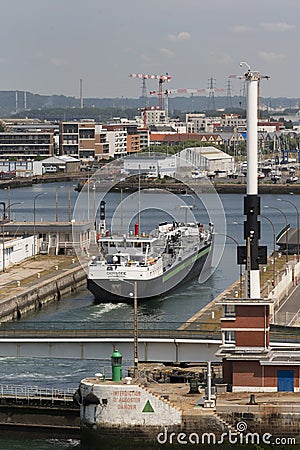 Inland tanker vessel underway in the Port of Le Havre, northern France, Europe. Editorial Stock Photo