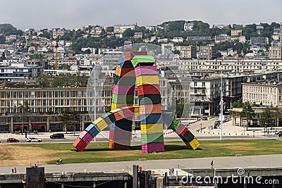 Metal shipping containers form the shape of artwork arches in Le Havre France. Editorial Stock Photo