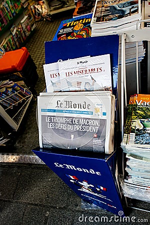 Le Monde with President`s Challenges Emmanuel Macron after elect Editorial Stock Photo