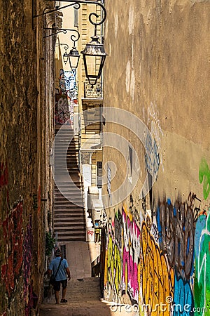 In narrow streets of Le Panier quarter at Marseille Editorial Stock Photo