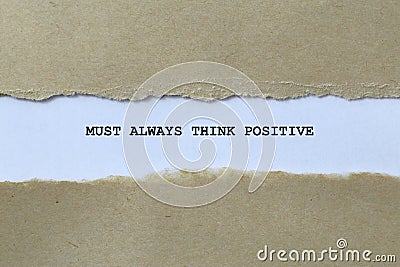 must always think positive on white paper Stock Photo