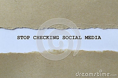 stop checking social media on white paper Stock Photo