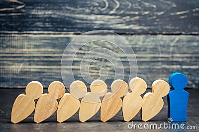 Leader businessman stops falling dominoes. Strong and reliable boss. Difficulties in business and their solution. Support team. Th Stock Photo