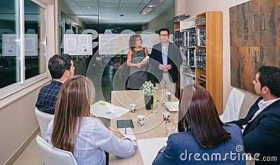 Leader team having bussiness meeting in headquarters Stock Photo