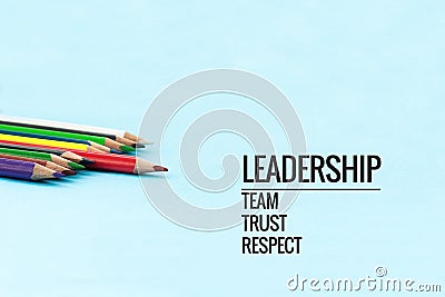 Leadership business concept. Gold color pencil lead other color with word Leadership, team, trust and respect on black background Stock Photo