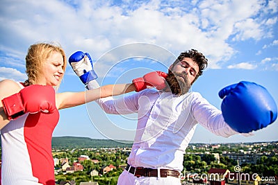 Leadership family relations. Couple boxing gloves fight sky background. Things guy can do to make woman happy. How to Stock Photo