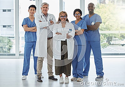 Leadership portrait, doctors and nurses with arms crossed standing together in hospital. Face, teamwork and confident Stock Photo