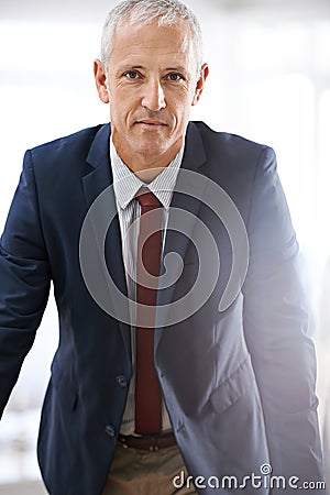 Leadership, portrait and mature businessman, serious ceo or senior manager at corporate startup office. Trust Stock Photo