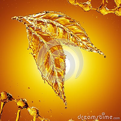 Leaf made of oil splash on gold background Stock Photo