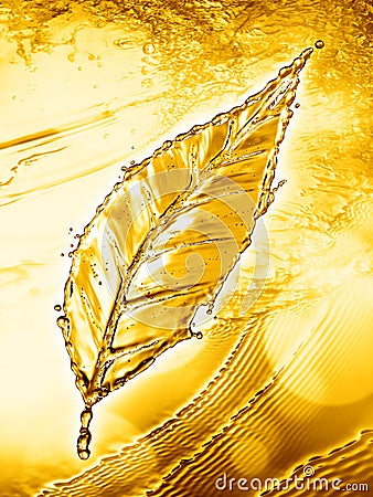 Leaf made of water splash gold color Stock Photo