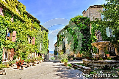 Leafy town square in a beautiful village in Provence, France Stock Photo