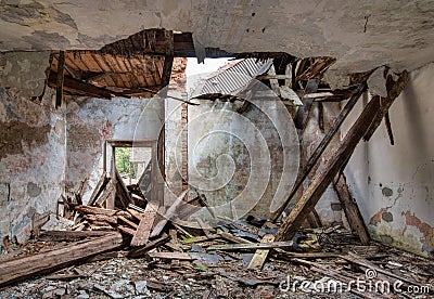 Leaky roof - interior of the old, abandoned and crumbling building Stock Photo