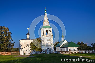 Leaning bell tower and two churches in the village of Kideksha. Stock Photo