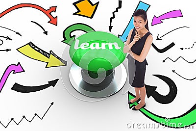 Learn against digitally generated green push button Stock Photo