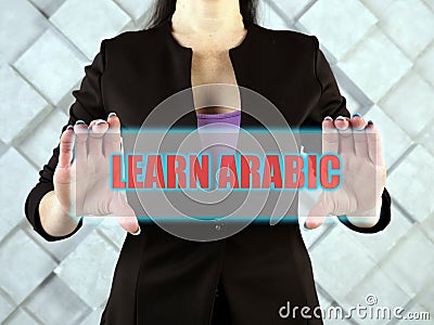 LEARN ARABIC phrase on the screen Stock Photo