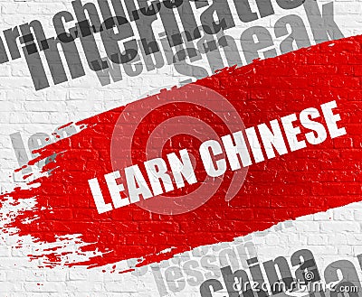 Learn Chinese on White Brickwall. Stock Photo