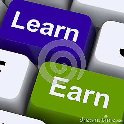 Learn And Earn Computer Keys Showing Working Or Studying Stock Photo