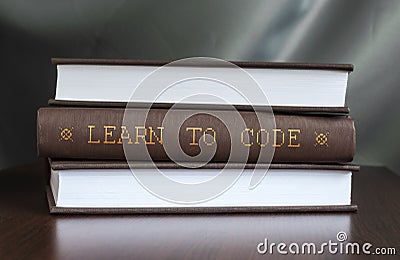 Learn to code. Book concept. Stock Photo