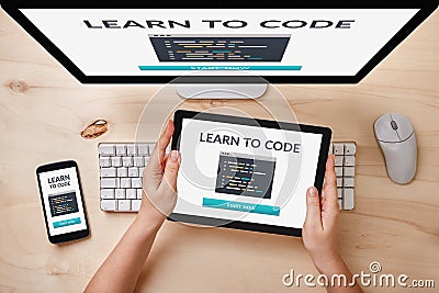 Learn to code concept on responsive devices Stock Photo