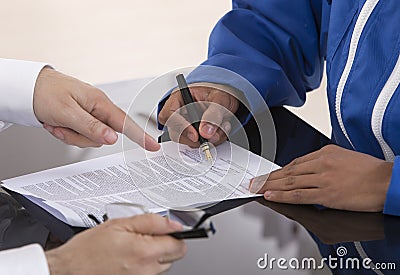 Learning contract signature Stock Photo