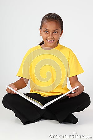 Learning by reading for young school girl 10 in ye Stock Photo