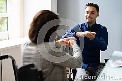 Learning Sign Language For Deaf People Stock Photo