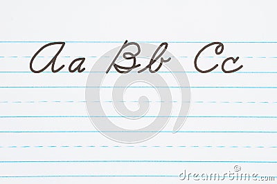 Learning to write cursive lettering Stock Photo