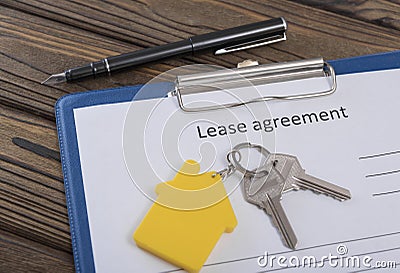 Lease agreement, house keys, key chain Stock Photo