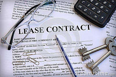 Lease contract with keys and glasses Stock Photo