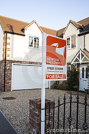 LEASINGHAM, UK - 15 AUGUST 2015. For sale sign outside large fa Editorial Stock Photo