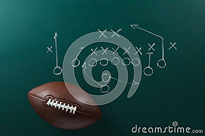 Leather American football on chalkboard Stock Photo