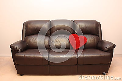 Leather couch with heart Stock Photo