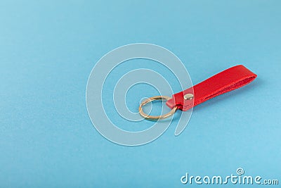 Leather keychain with a key ring on background. Stock Photo