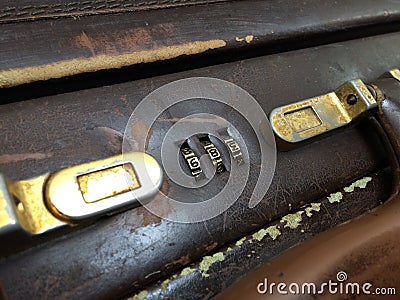 Combination lock Leather briefcase closeup on white background Stock Photo