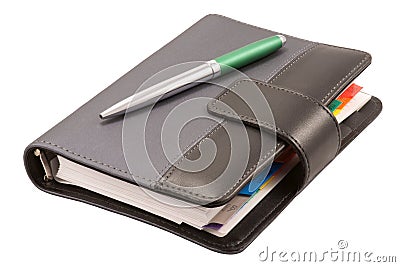 Leather organizer and pen Stock Photo