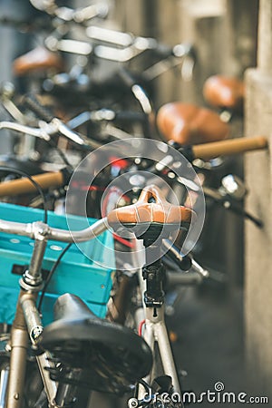 Leather saddle of bicycle parked in the street of Budapest Stock Photo