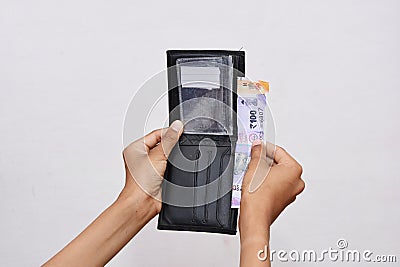 Leather wallet, hand kept in indian currencies Stock Photo