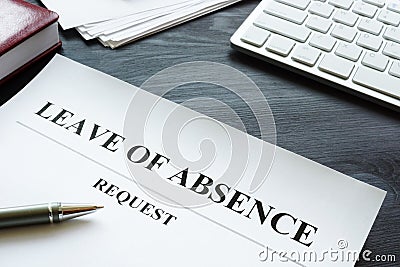 Leave of absence request on the table Stock Photo