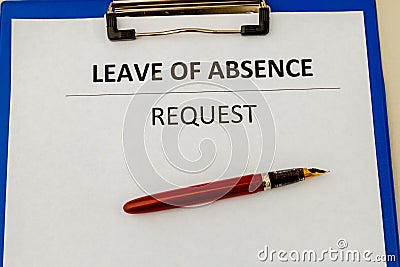 Leave of absence request on the tablet at the table. Stock Photo