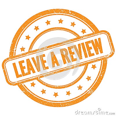 LEAVE A REVIEW text on orange grungy round rubber stamp Stock Photo