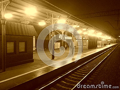 Leaving the Railway Station by Night Stock Photo