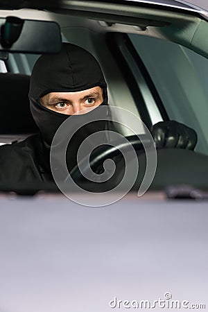 Leaving with stolen vehicle Stock Photo