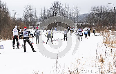 Leaving the track skiers. Editorial Stock Photo