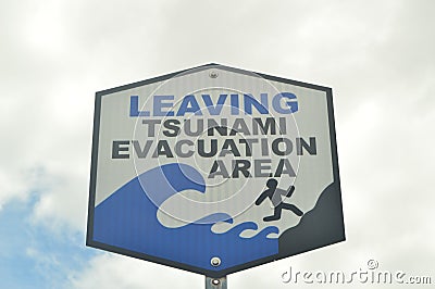 Leaving Tsunami Evacuation Area Sign. Editorial Stock Photo