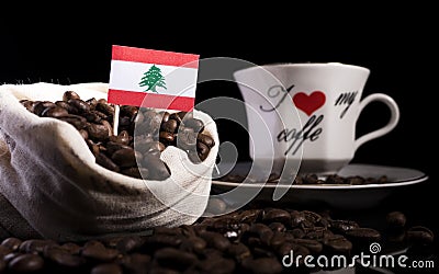 Lebanese flag in a bag with coffee beans on black Stock Photo