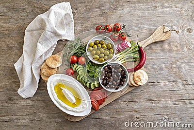 Lebanese food of Labneh Yogurt cheese, vegetables and olives Stock Photo