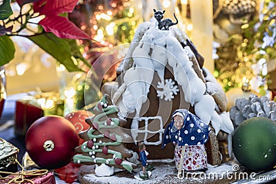 Gingerbread house with Christmas decoration and bokeh Stock Photo