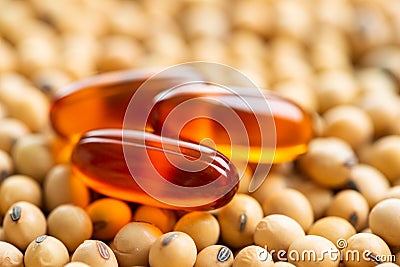 Lecithin gel pills capsule with soy background Stock Photo