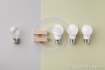 Led and incandescent lightbulb compare top view. Energy saving, power efficiency and eco friendly concept Stock Photo