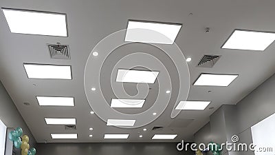 Led panel lamp on modern office ceiling Stock Photo